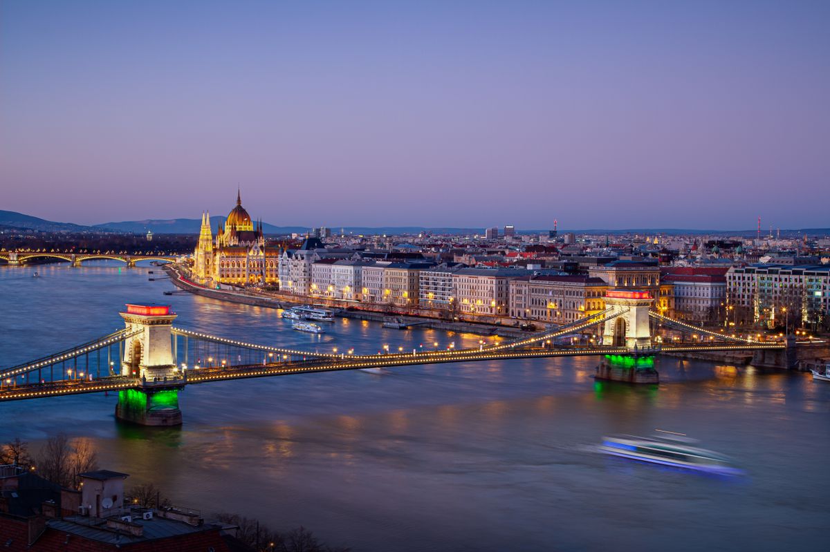 Historic Chain Bridge in Budapest is illuminated with the Hungarian tricolor to mark the country's National Day on March 15, 2020.