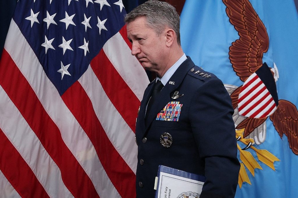 ARLINGTON, VIRGINIA - MARCH 19: Chairman of the Joint Chiefs of Staff Air Force General Dan Caine departs a press briefing on continued military operations at the Pentagon on March 19, 2026 in Arlington, Virginia. The U.S. and Israel continue their joint attack on Iran that began on February 28.   Win McNamee/Getty Images/AFP (Photo by WIN MCNAMEE / GETTY IMAGES NORTH AMERICA / Getty Images via AFP)
