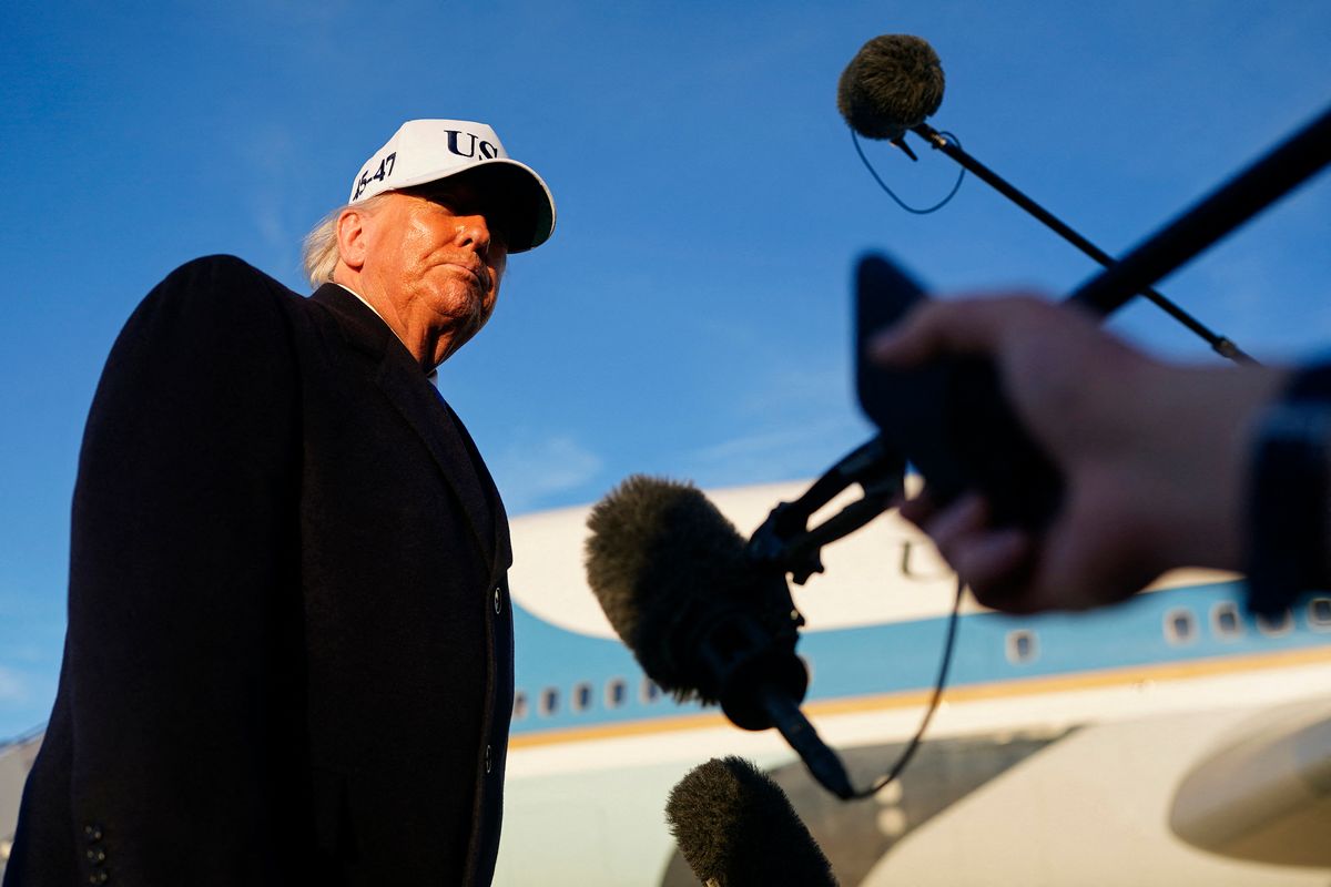 JOINT BASE ANDREWS, MARYLAND - MARCH 13: U.S. President Donald Trump takes questions from the media before boarding Air Force One on March 13, 2026 at Joint Base Andrews, Maryland. Trump is traveling to Florida to spend the weekend at his Mar-a-Lago resort.   Nathan Howard/Getty Images/AFP (Photo by Nathan Howard / GETTY IMAGES NORTH AMERICA / Getty Images via AFP)
