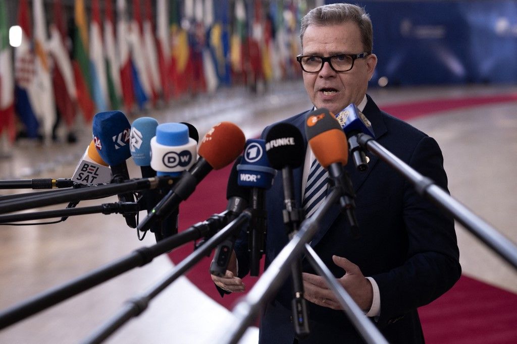 Finland's Prime Minister Petteri Orpo speaks to journalists as he arrives for a EU Summit at the EU headquarters in Brussels, on March 19, 2026. European Union leaders meet in the context of the US-Israeli war against Iran that is consuming the Middle East, and its consequences on energy prices and security. (Photo by JOHN THYS / AFP)