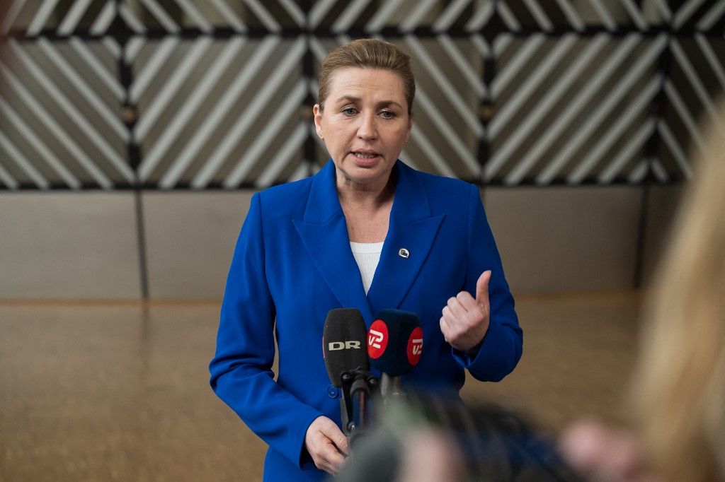 Denmark's Prime Minister Mette Frederiksen speaks to journalists as she arrives prior to the European summit meeting in Brussels, Belgium, on March 19, 2026. The summit will address the military escalation in the Middle East and the situation in Iran, including its consequences on the European Union in terms of energy prices and energy security. (Photo by Jonathan Raa/NurPhoto) (Photo by Jonathan Raa / NurPhoto via AFP)