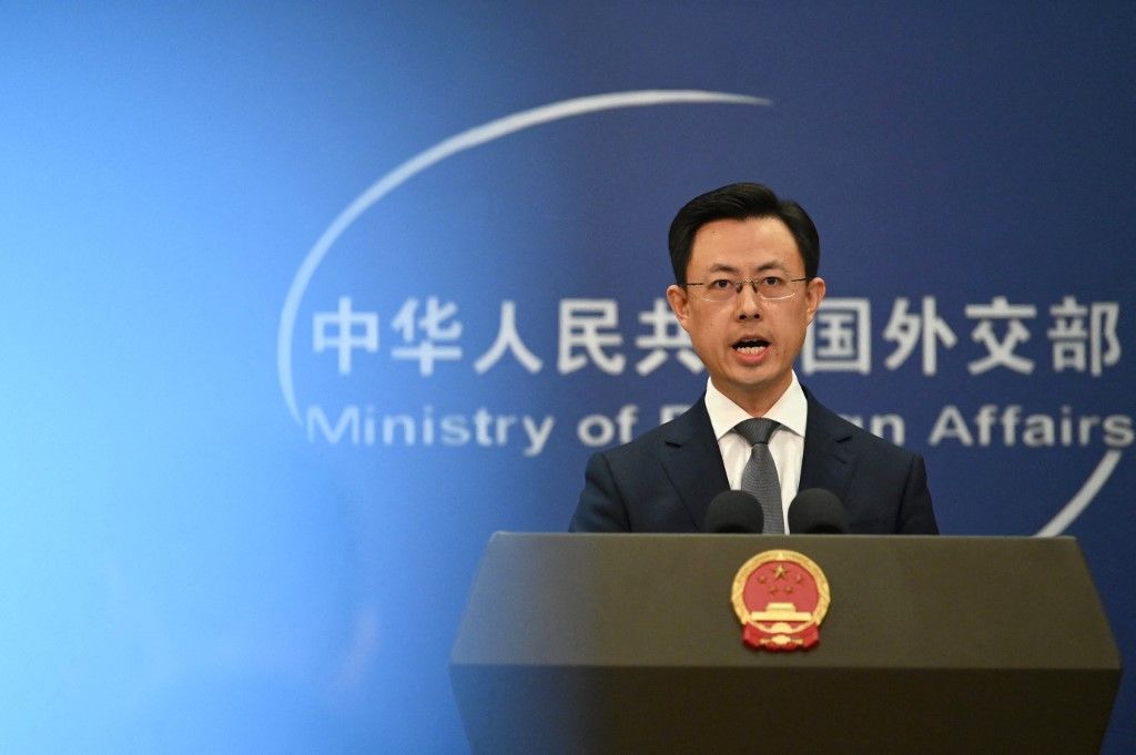 08 December 2025, China, Peking: Guo Jiakun, China's Foreign Office spokesperson, speaks to journalists. On the occasion of the visit by Federal Foreign Minister Johann Wadephul (CDU), the Foreign Office said that China also sees a benefit for world peace in the consolidation of German-Chinese relations. Photo: Johannes Neudecker/dpa (Photo by Johannes Neudecker / dpa Picture-Alliance via AFP)