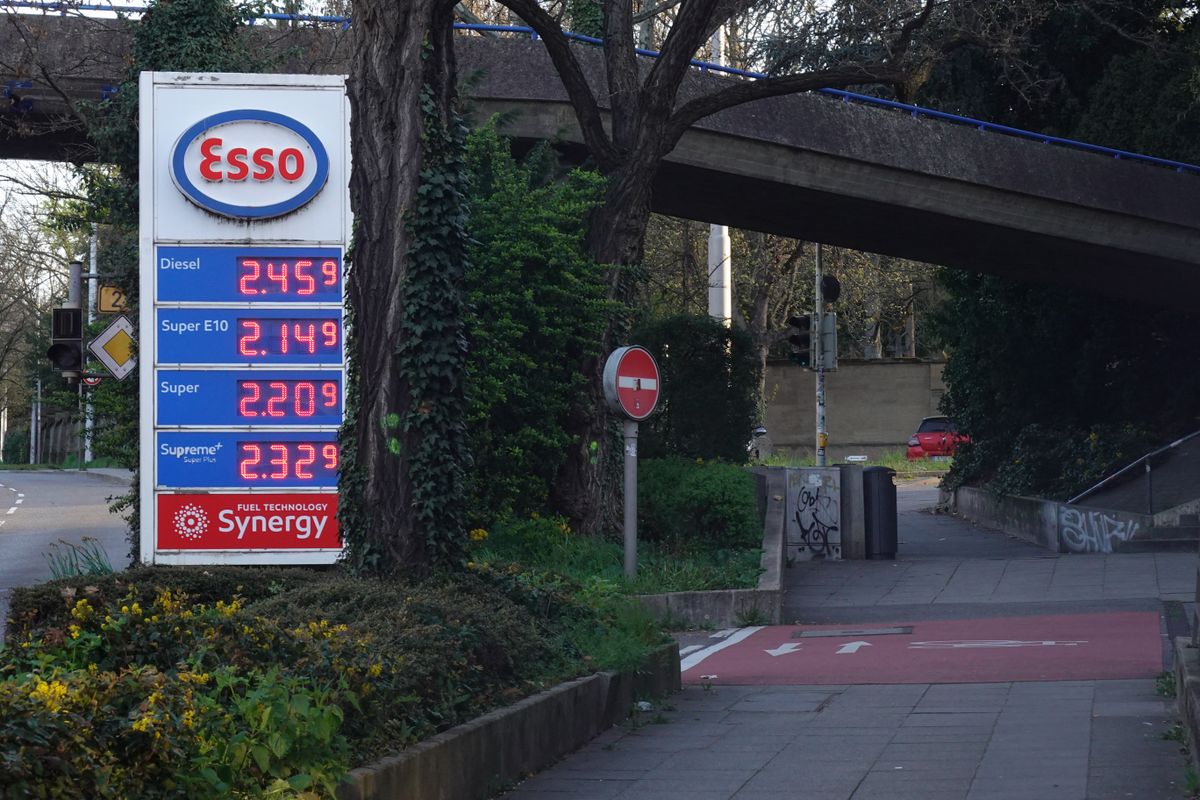 Fuel pumps and a price board are seen at an Esso gas station in Stuttgart, Baden-Wuerttemberg, Germany, on April 6, 2026. High fuel prices are affecting motorists and transport costs, with diesel prices in Germany reaching a new record high. Other European countries are implementing subsidies, tax cuts, and price caps. (Photo by Michael Nguyen/NurPhoto) (Photo by Michael Nguyen / NurPhoto via AFP)