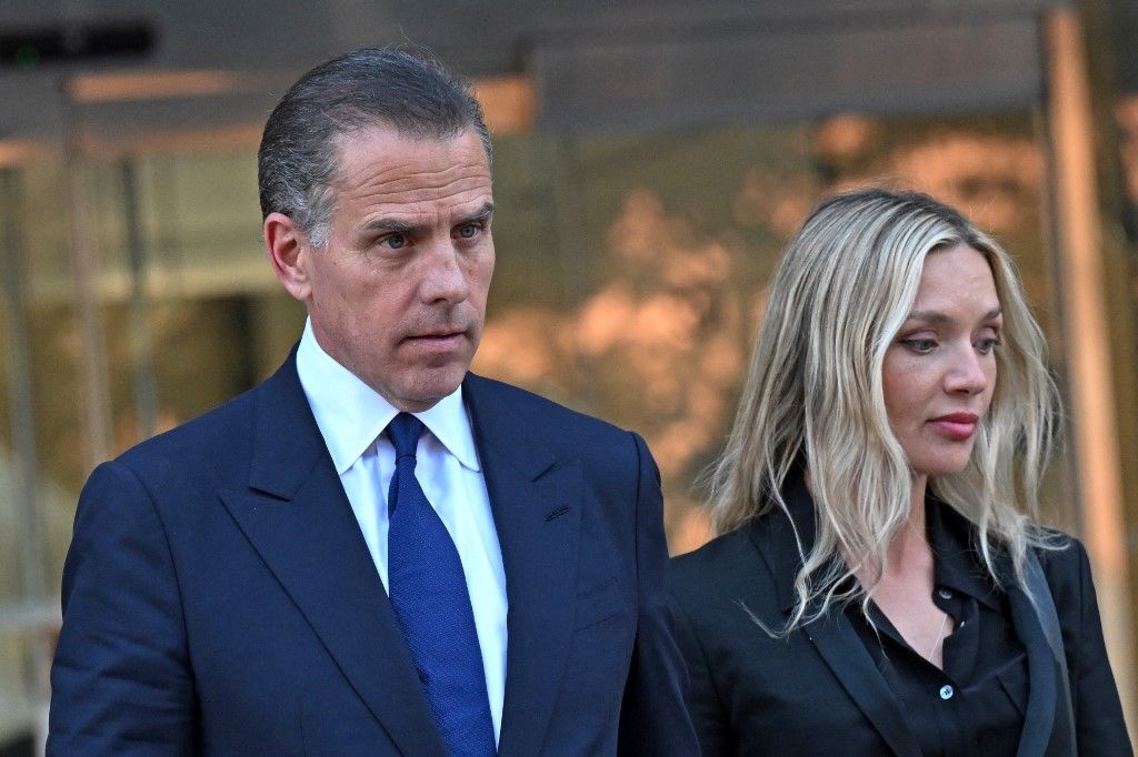 Hunter Biden (L), son of US President Joe Biden, and his wife Melissa Cohen, leave court after his guilty plea in his trail on tax evasion in Los Angeles, California, on September 5, 2024. US President Joe Biden's son, Hunter, pleaded guilty September 5, 2024 to all nine tax charges he faced, without reaching a deal with prosecutors. Before he entered the pleas in a Los Angeles court, US District Judge Mark Scarsi told him he could face up to 17 years in prison along with a $1 million fine. (Photo by Robyn Beck / AFP)