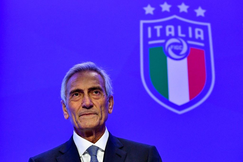 (FILES) New President of the Italian Football Federation (FIGC), Gabriele Gravina poses with the federation's logo following the vote during the elective assembly of the FIGC on October 22, 2018 at the Hilton hotel of Rome's Fiumicino airport. Italy's Sport Minister Andrea Abodi said on April 1, 2026 the head of the country's football federation should step down after the national team failed to qualify for a third consecutive World Cup. The Azzurri fell at the play-offs again, this time after a penalty shoot-out against Bosnia and Hercegovina on March 31, and will miss this summer's finals in the United States, Canada and Mexico. (Photo by Alberto PIZZOLI / AFP)