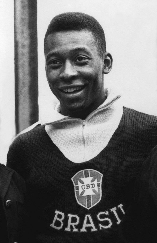 Brazilian forward Pele smiles as he poses for photographers in June 1962 in Vina del Mar, a few days before a World Cup quarterfinal soccer match between Brazil and England 10 June. Pele did not participate in that match and was out for the remainder of the competition after pulling a muscle during the first-round match against Czechoslovakia 02 June. AFP PHOTO (Photo by AFP)