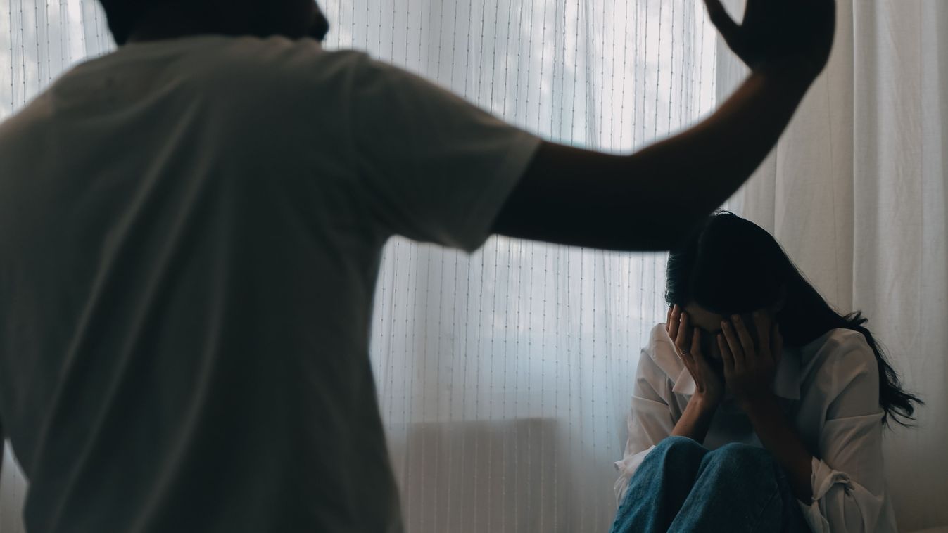 Upset woman having a fight with a man at home. Hispanic wife slapping the face of her husband during an argument because of their relationship problems

2396639619