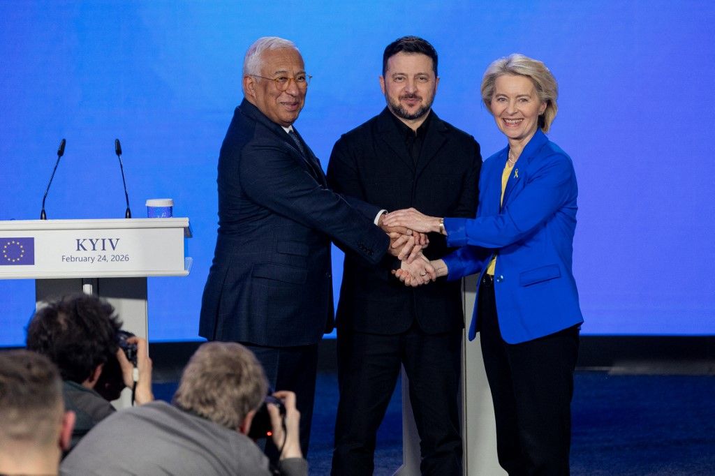 European Council President Antonio Costa (L), Ukraine's President Volodymyr Zelensky (C) and the President of the European Commission Ursula von der Leyen (R) posing for a photo during a press conference in Kyiv on February 24, 2026, as Ukraine marks the fourth anniversary of Russia's invasion. EU chief said on February 24, 2026 the bloc would make good on a 90-billion-euro ($106-billion) loan for Ukraine despite the Kremlin-friendly leader of Hungary, Viktor Orban, blocking the measure. (Photo by Tetiana DZHAFAROVA / AFP)