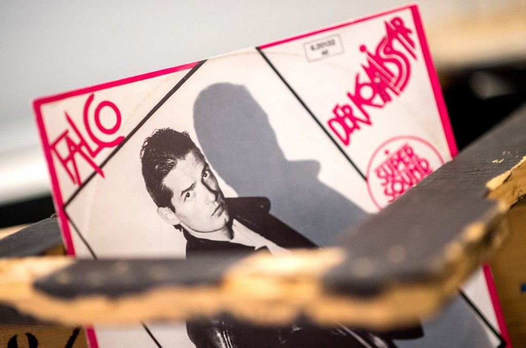 17 October 2018, Lower Saxony, Hanover: A record cover of the single "Der Kommissar" by the late musician Falco can be found in a showcase in the exhibition "Falco, in Gars am Kamp" in the Theatermuseum. The exhibition shows many personal objects from the Art Nouveau villa of the pop legend and can be seen until 17 March 2019. Photo: Hauke-Christian Dittrich/dpa (Photo by Hauke-Christian Dittrich / dpa Picture-Alliance via AFP)