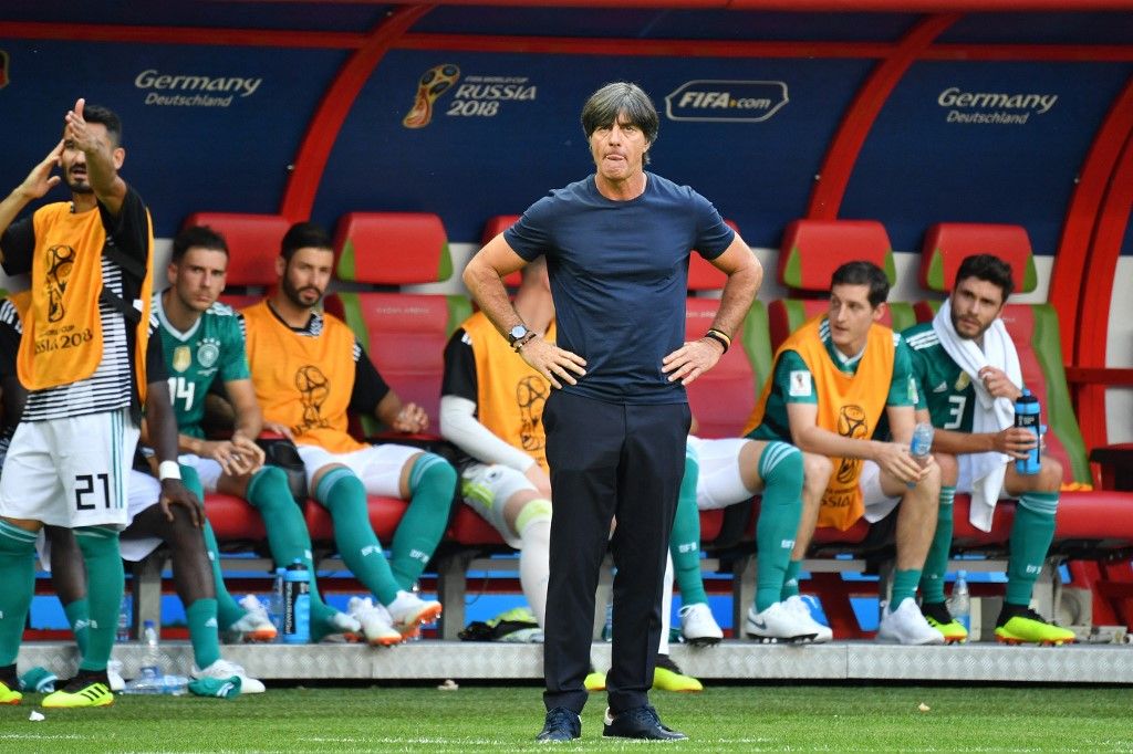 Federal coach Joachim Jogi LOEW, LOW (GER), single image, cut out, full body shot, whole figure. , South Korea (KOR) - Germany (GER) 2-0, Preliminary Round, Group F, Match 43, on 27.06.2018 in Kazan, Kazan-Arena. Football World Cup 2018 in Russia from 14.06. - 15.07.2018. | usage worldwide (Photo by Frank Hoermann/SVEN SIMON / SVEN SIMON / dpa Picture-Alliance via AFP)