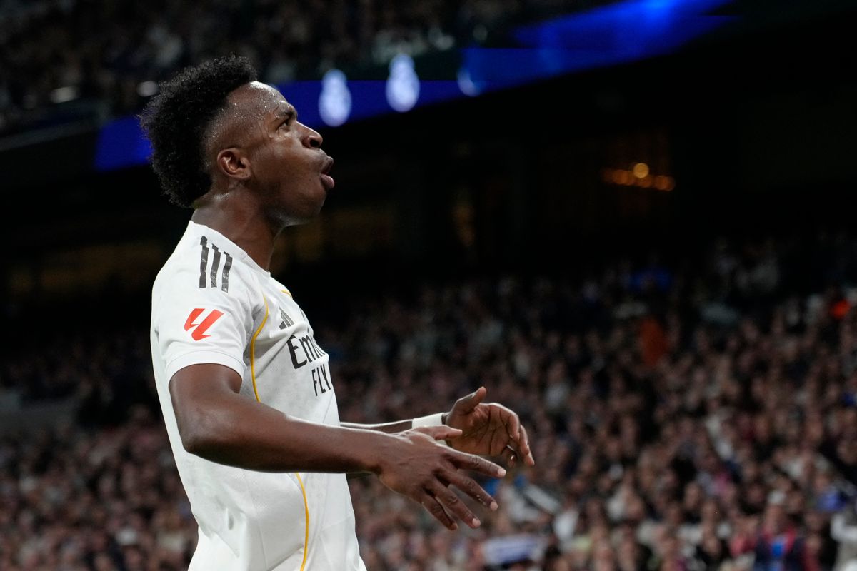 Vinicius Junior left winger of Real Madrid and Brazil reacts during the La Liga EA Sports match between Real Madrid CF and Atlético de Madrid at Estadio Santiago Bernabeu on March 22, 2026 in Madrid, Spain. (Photo by Jose Breton/Pics Action/NurPhoto) (Photo by Jose Breton / NurPhoto via AFP)