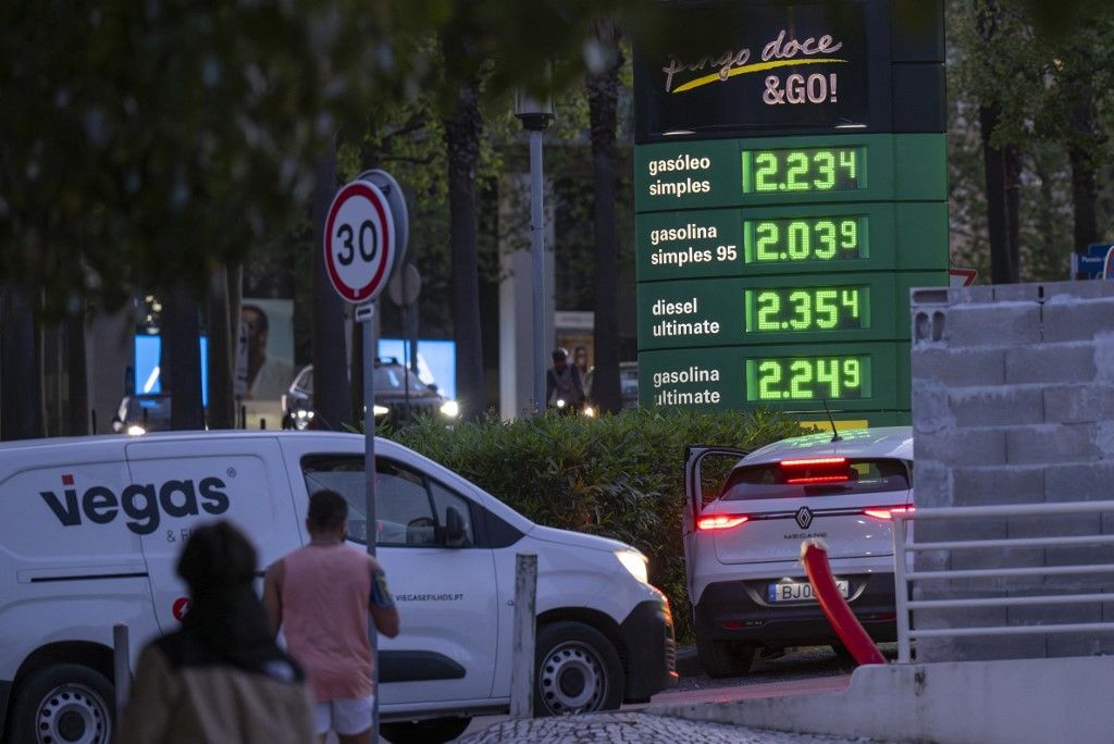 Fuel prices are displayed on a chart at a petrol station in Lisbon, Portugal, on April 2, 2026. Portugal's latest fuel price increase reflects the energy market's sensitivity to geopolitical tensions. Experts note that recent events involving the United States and Iran have contributed to volatility in oil prices, affecting prices across Europe. (Photo by Jorge Mantilla/NurPhoto) (Photo by Jorge Mantilla / NurPhoto via AFP)