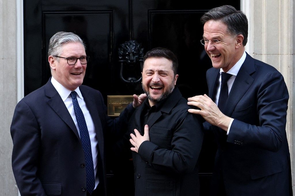 Britain's Prime Minister Keir Starmer (L), NATO Secretary General Mark Rutte (R) and Ukraine's President Volodymyr Zelensky react following a meeting at 10 Downing Street, in central London, on March 17, 2026. (Photo by Toby Shepheard / AFP)