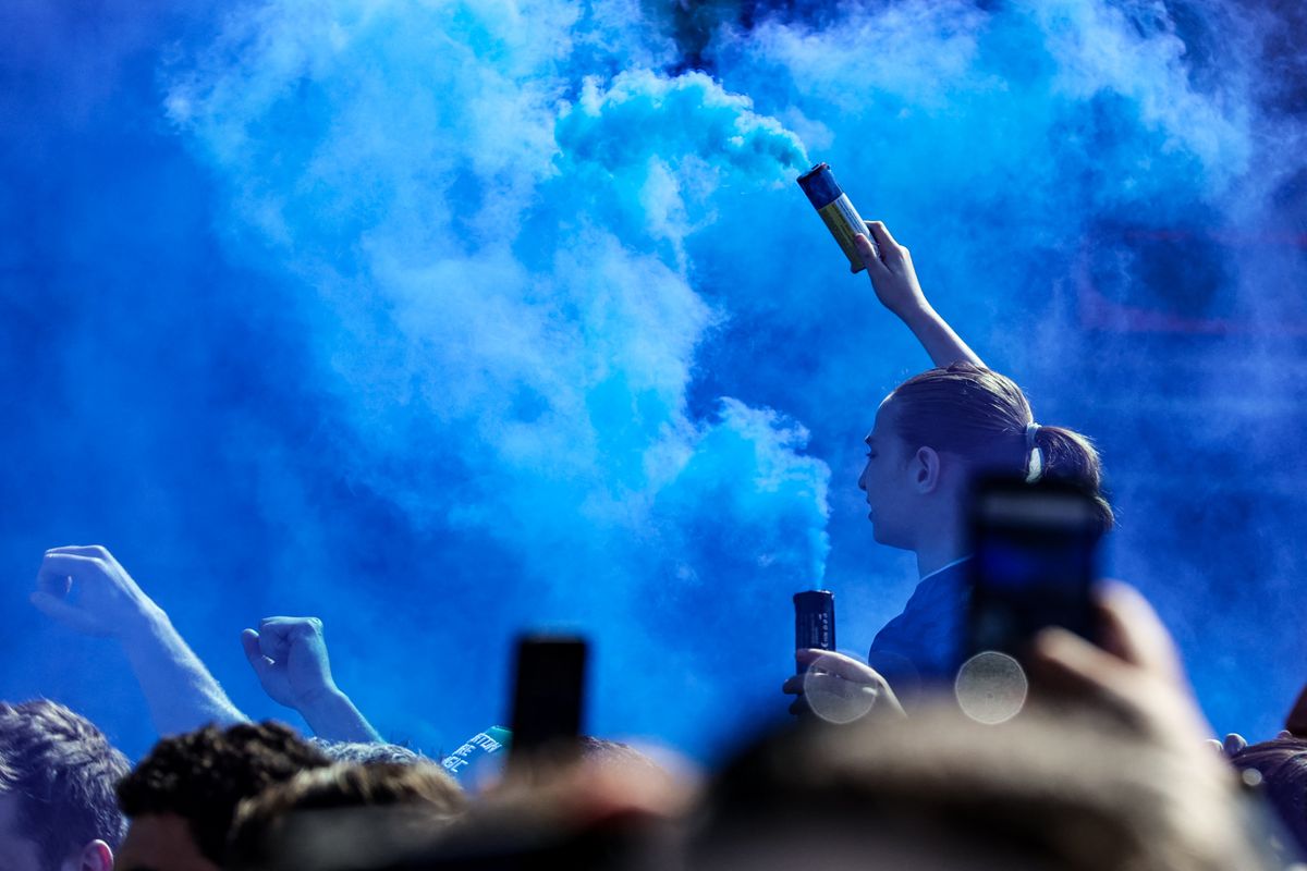 Everton fans arrive at Hill Dickinson with flares for derby day during the Premier League match between Everton and Liverpool at Hill Dickinson Stadium in Liverpool, United Kingdom, on April 19, 2026. (Photo by Alfie Cosgrove/News Images/NurPhoto) (Photo by News Images / NurPhoto via AFP)