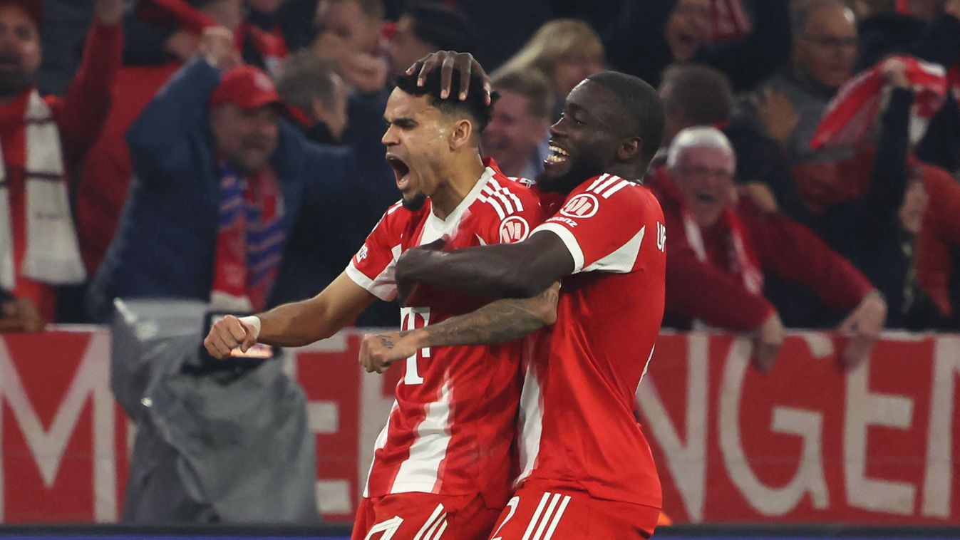 Real Madrid
Bayern Munich's Colombian forward #14 Luis Diaz celebrates with Bayern Munich's French defender #02 Dayot Upamecano (R) after scoring the equalizing 3-3 goal during the UEFA Champions League quarter-final second leg football match between FC B