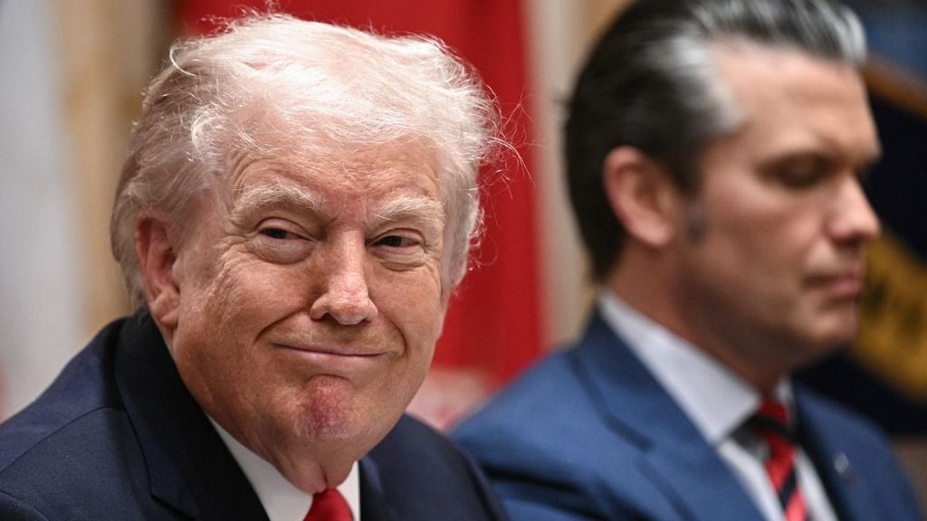 US President Donald Trump, alongside Secretary of Defense Pete Hegseth (R), hosts a cabinet meeting in the Cabinet Room of the White House in Washington, DC, on January 29, 2026. (Photo by Brendan SMIALOWSKI / AFP)