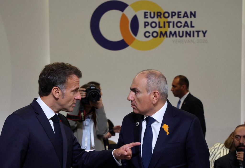 France's President Emmanuel Macron and Armenia's Prime Minister Nikol Pashinyan attend a session of the 8th European Political Community (EPC) summit in Yerevan on May 4, 2026. (Photo by Ludovic MARIN / AFP)