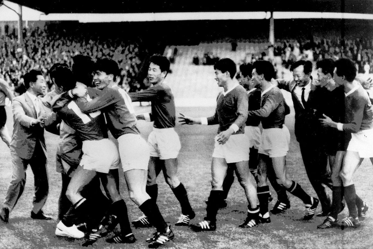 North Korean national soccer team players celebrate their upset victory (1-0) over Italy 19 July 1966 in Middlesbrough at the end of their World Cup first round match. Doo Ik Pak scored the winning goal. AFP PHOTO (Photo by AFP)