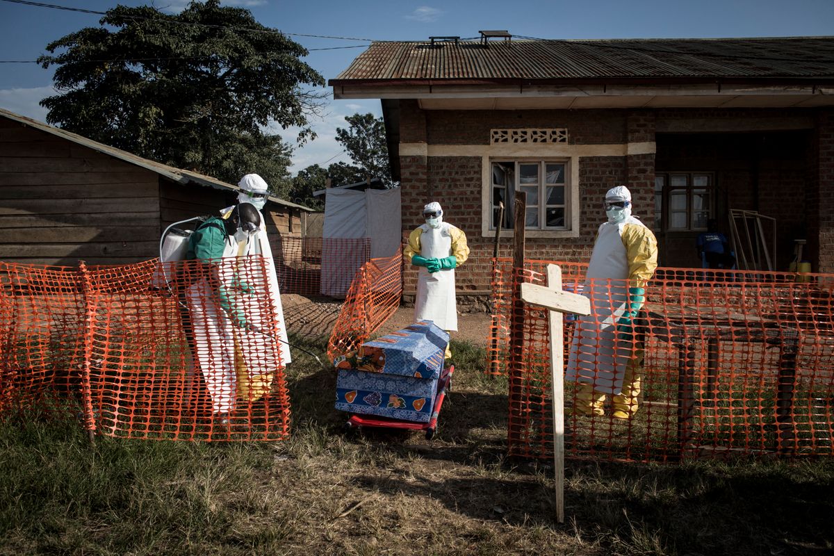 (FILES) Medical workers disinfect the coffin of a deceased unconfirmed Ebola patient inside an Ebola Treatment Centre run by The Alliance for International Medical Action (ALIMA) on August 13, 2018, in Beni. An outbreak of the ebola virus has been blamed for dozens of deaths in the east of the Democratic Republic of the Congo, African health authorities said on May 15, 2026.
The outbreak is in Ituri province. (Photo by John WESSELS / AFP)