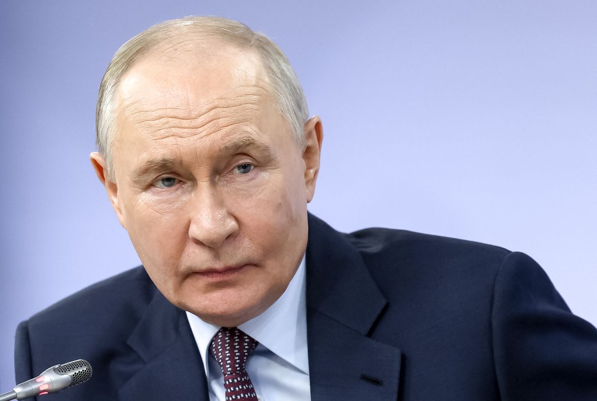 In this pool photograph distributed by the Russian state agency Sputnik, Russia's President Vladimir Putin looks on during a meeting with representatives of Russia's indigenous minorities as part of the educational marathon in Moscow on April 30, 2026. (Photo by Viacheslav PROKOFIEV / POOL / AFP)