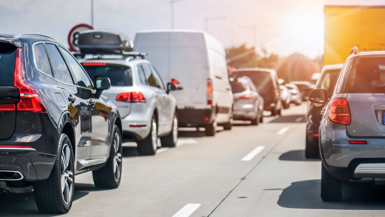 Cars rush hours city street. Car on highway in traffic jam on road.

1680948604
