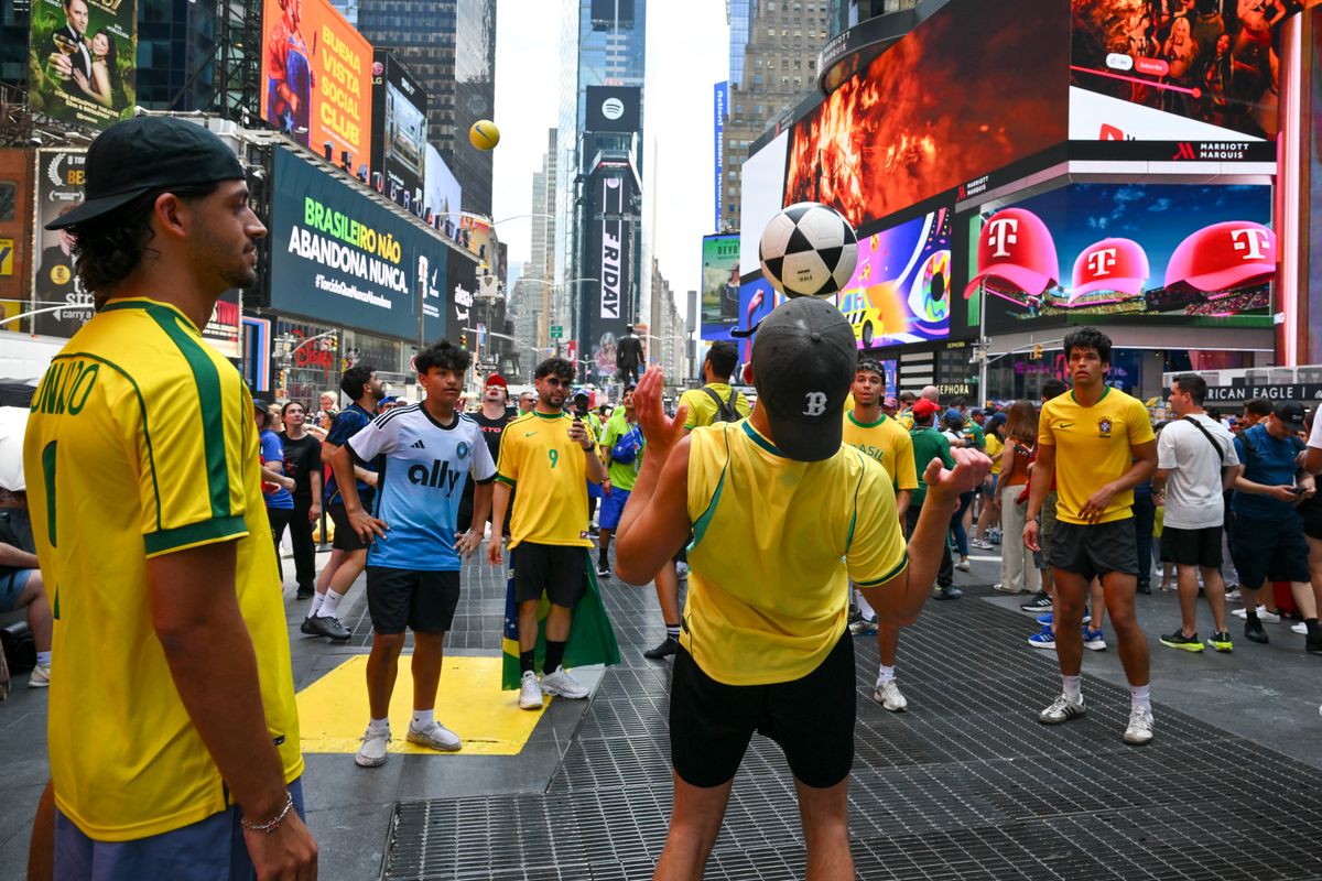 Lugas
Brazil fans play soccer in Times Square in New York on June 12, 2026, on the eve of Brazil's opening 2026 World Cup match against Morocco. (Photo by ANGELA WEISS / AFP)