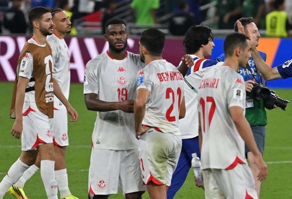 The Tunisian players are disappointed after being eliminated from the qualifying rounds after the Group F match between Tunisia and Japan at the FIFA World Cup 2026 at Estadio Monterrey in Guadalupe, Nuevo León, Mexico, on June 20, 2026. ( The Yomiuri Shimbun ) (Photo by Keita Iijima / The Yomiuri Shimbun via AFP)