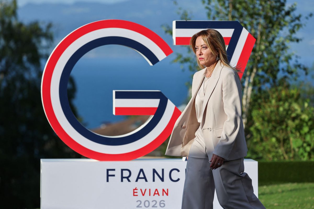 Italy's Prime Minister Giorgia Meloni arrives for the official greeting during the G7 summit, in Evian, eastern France, on June 15, 2026. A G7 summit is set to take place June 15 to 17 in the French town of Evian-les-Bains near Switzerland and it will be attended by country leaders as well as the EU's foreign policy chief and ministers from Brazil, Canada, the United Arab Emirates and Turkey. (Photo by Ludovic MARIN / AFP)