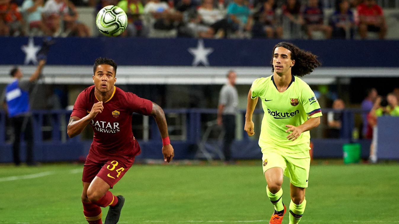 Cucurella
AS Roma's Justin Kluivert (L) fights for the ball with FC Barcelona's Marc Cucurella during the International Champions Cup (ICC) friendly football match between AS Roma and FC Barcelona on July 31, 2018 at AT&T Stadium in Arlington, Texas. (Pho