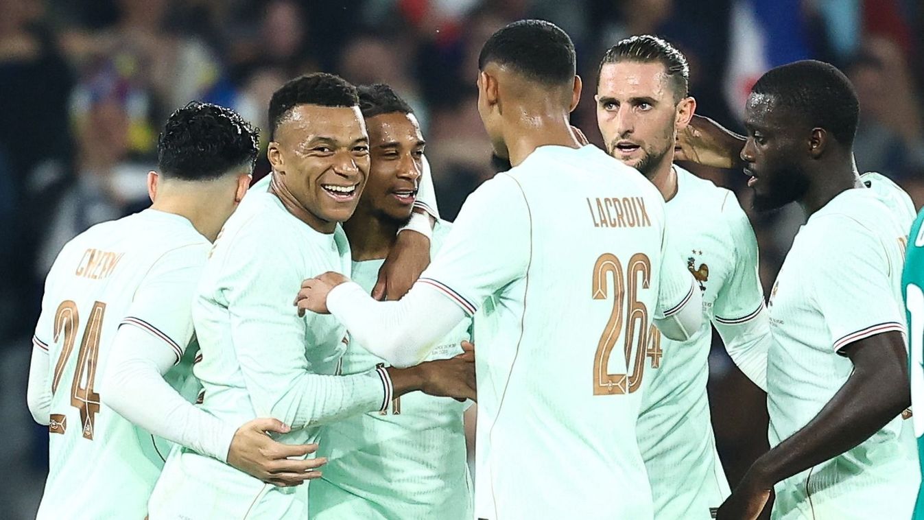 Michael Olise
France's forward #11 Michael Olise (3L) celebrates scoring his team's third goal with teammate France's forward #10 Kylian Mbappe (2L) during the international friendly football match between France and North Ireland at the Decathlon Arena -