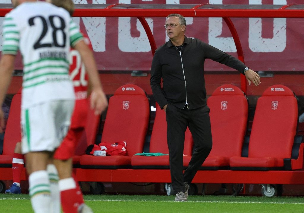 FC Twente coach John van den Brom is pictured during the UEFA Europa League second qualifying round match between FC Twente and Ferencvaros at the Grolsch Veste in Enschede, the Netherlands, on July 23, 2026. (Photo by Peter Lous/EYE4IMAGES/NurPhoto) (Photo by Peter Lous / NurPhoto via AFP)