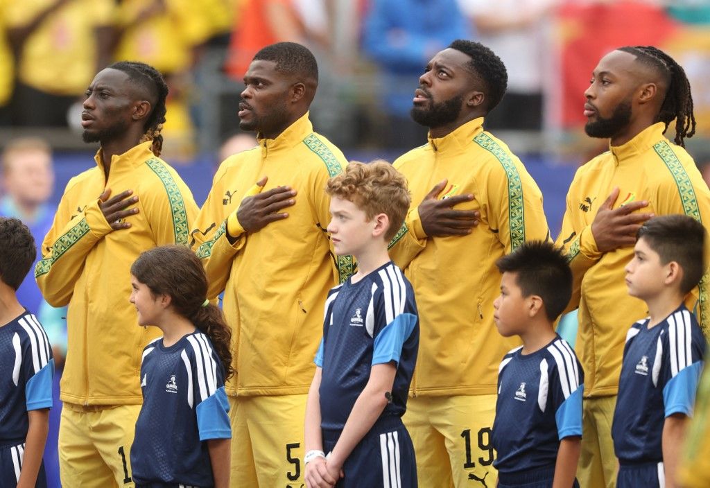 FOXBOROUGH, MASSACHUSETTS - JUNE 23: Gideon Mensah #14, Thomas Partey #5, Inaki Williams #19 and Antoine Semenyo #11 of Ghana stand for the national anthem before the FIFA World Cup 2026 Group L match between England and Ghana at Boston Stadium on June 23, 2026 in Foxborough, Massachusetts.   Richard Pelham/Getty Images/AFP (Photo by Richard Pelham / GETTY IMAGES NORTH AMERICA / Getty Images via AFP)