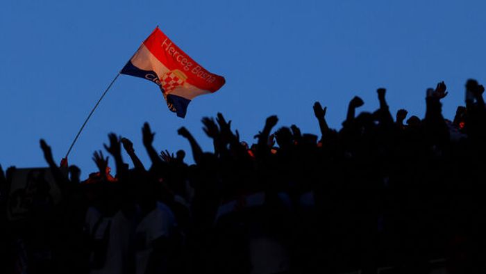 Lugas 0711
A Croatian fan waves a national flag during the 2026 World Cup Group L football match between Panama and Croatia at the Toronto Stadium in Toronto on June 23, 2026. (Photo by Cole Burston / AFP)