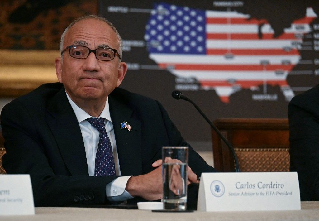 (FILES) Senior Advisor to the FIFA President Carlos Cordeiro looks on as he attends a meeting of the White House Task Force on the FIFA World Cup 2026, in the East Room of the White house in Washington, DC, on May 6, 2025. The Asian Football Confederation (AFC) joined UEFA and CONCACAF in condemning world football's governing body FIFA's proposed private investment plan, saying on July 31, 2026, that they were alarmed it had reached the point a "World Cup boycott has entered public discourse". A damaging blow to FIFA president Gianni Infantino came with the later resignation of a senior advisor Carlos Cordeiro, who issued an excoriating statement. (Photo by Jim WATSON / AFP)
