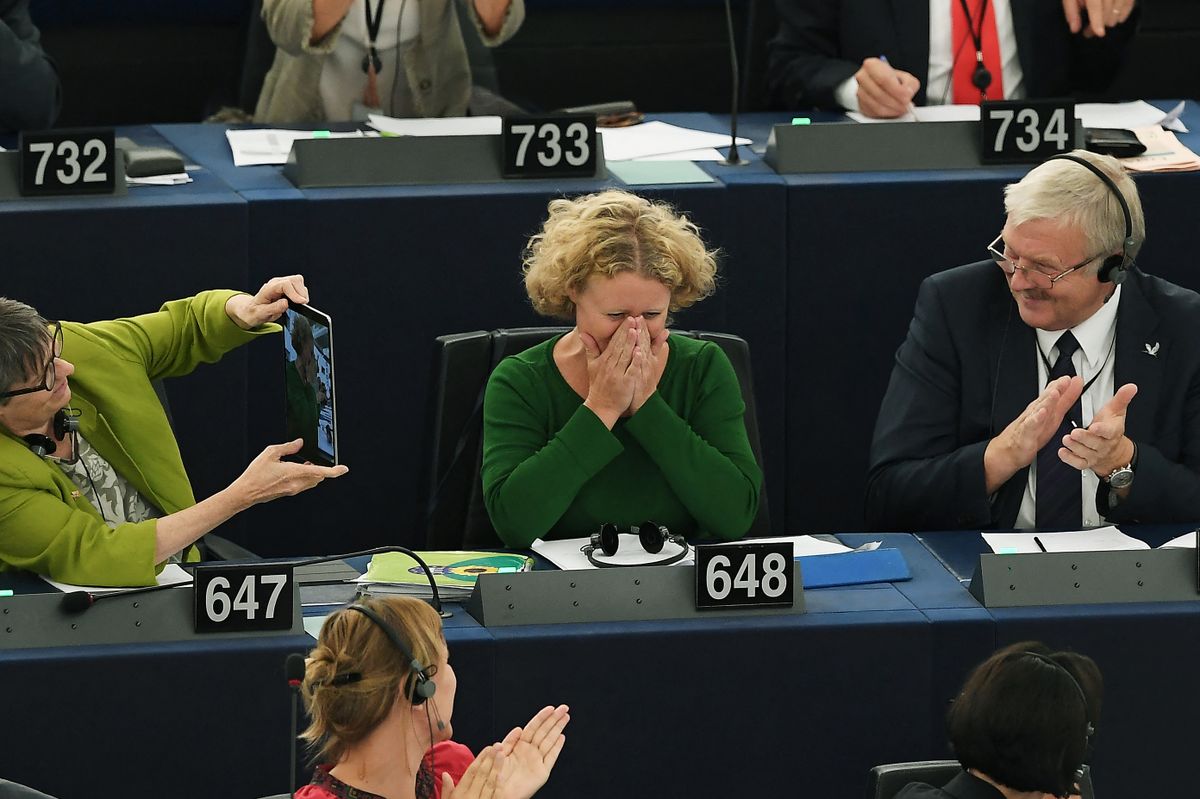 Member of European Parliament Judith Sargentini (C) reacts after the vote on the situation in Hungary during a voting session at the European Parliament on September 12, 2018 in Strasbourg, eastern France. (Photo by FREDERICK FLORIN / AFP)