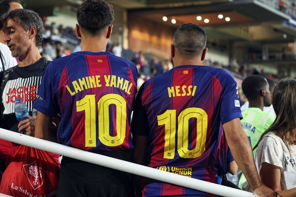FC Barcelona supporters attend the match between FC Barcelona and Paris Saint-Germain FC, corresponding to Matchday 2 of the League phase of the UEFA Champions League, at the Lluis Companys Stadium in Barcelona, Spain, on October 1, 2025. (Photo by Joan Valls/Urbanandsport/NurPhoto) (Photo by Urbanandsport / NurPhoto via AFP)