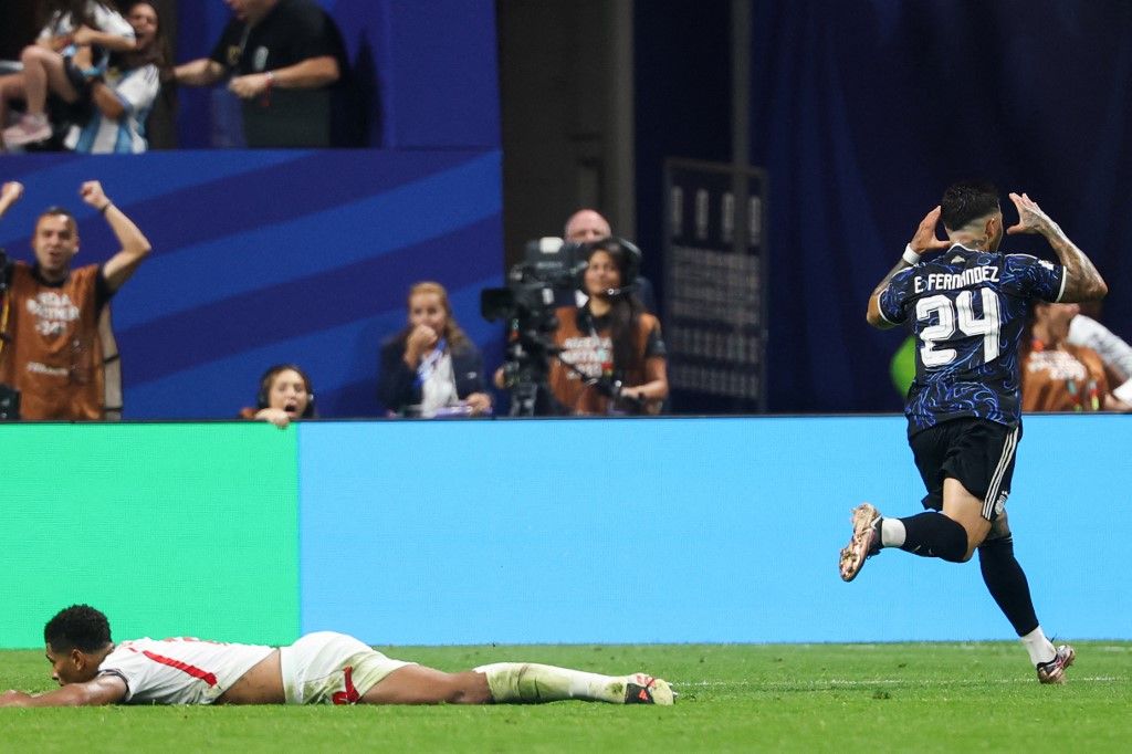Argentina's midfielder #24 Enzo Fernandez celebrates scoring his team's first goal past England's midfielder #10 Jude Bellingham during the 2026 World Cup football tournament semi-final match between England and Argentina at the Atlanta Stadium in Atlanta on July 15, 2026.  (Photo by Odd ANDERSEN / AFP)