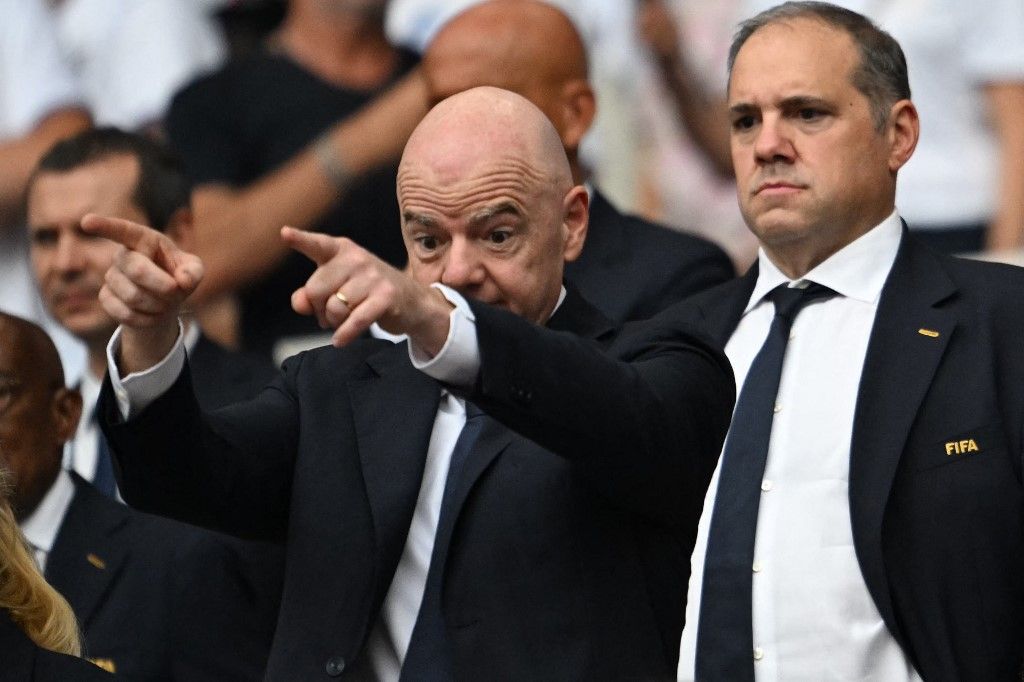 FIFA President Gianni Infantino (L) and CONCACAF President Victor Montagliani attend the 2026 World Cup football tournament quarter-final match between Norway and England at Miami Stadium in Miami on July 11, 2026. (Photo by ROBERTO SCHMIDT / AFP)