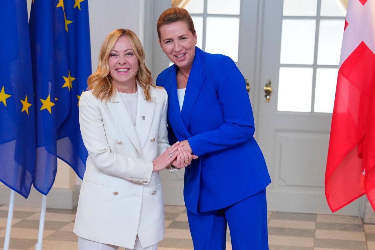 Denmark's Prime Minister Mette Frederiksen welcomes Italy's Prime Minister Giorgia Meloni to an informal summit in the Danish parliament at Christiansborg Castle in Copenhagen on Wednesday, October 1, 2025. Denmark is hosting an informal summit for the EU's heads of state and government at Christiansborg on Wednesday and Thursday. The President of the European Council, the President of the EU Commission, the EU's foreign minister, the President of the European Parliament, and heads of state and government from the 27 EU countries are participating. The Ukrainian president is participating via video link. (Photo: Liselotte Sabroe/Scanpix 2025) (Photo by LISELOTTE SABROE / Ritzau Scanpix via AFP)