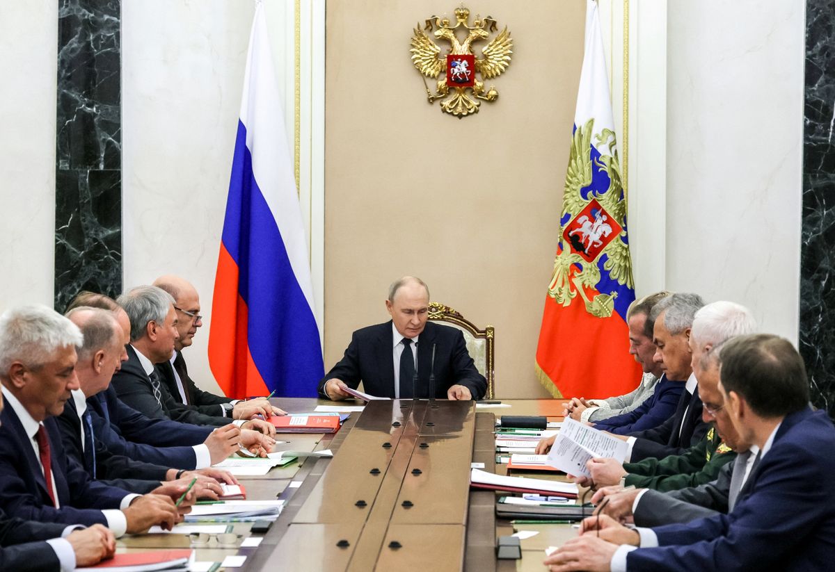 In this pool photograph distributed by Russian state owned agency Sputnik, Russia's President Vladimir Putin chairs Russia's Security Council meeting in Moscow on August 21, 2026. (Photo by Mikhail METZEL / POOL / AFP)