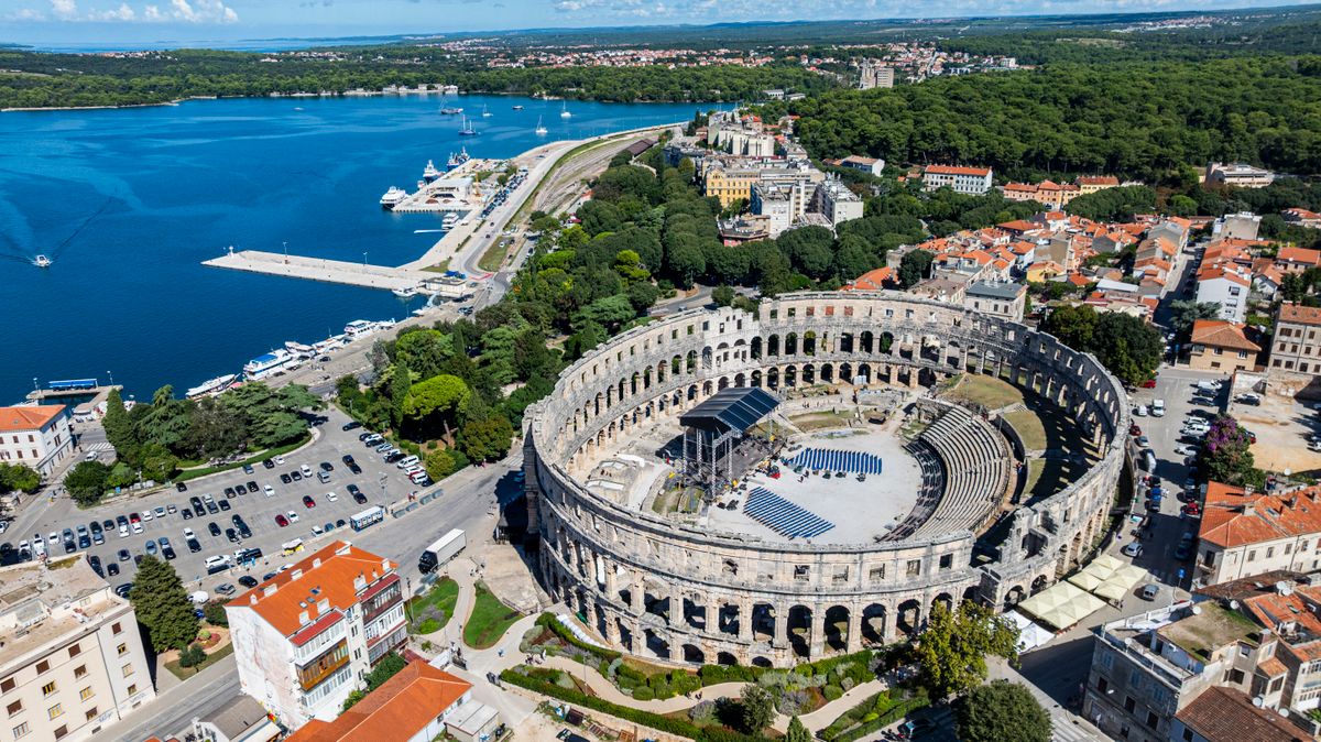 Aerial view of the Roman amphitheatre in Pula showcasing its structure and surrounding area from a high perspective in Croatia (Photo by Michael Runkel / Robert Harding RF / robertharding via AFP)