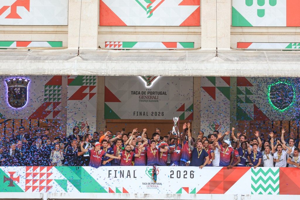 Stopira of SCU Torreense lifts the champions trophy during a Taca De Portugal 2025/26 match between Sporting CP and SCU Torreense at Estadio Nacional do Jamor on May 24, 2026, in Lisbon, Portugal. (Photo by Valter Gouveia/NurPhoto) (Photo by Valter Gouveia / NurPhoto via AFP)