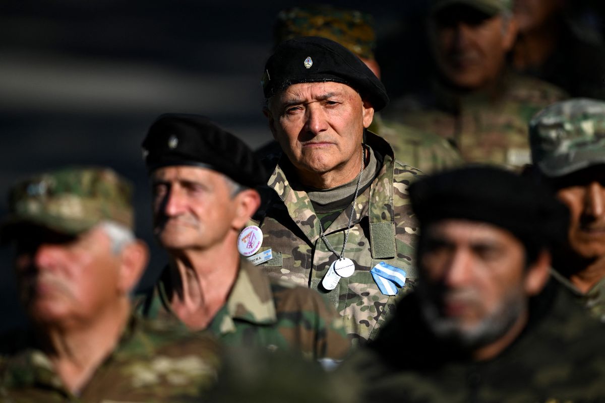 Malvinas (Falklands) war veterans attend a ceremony to commemorate the 43rd anniversary of the war between Argentina and the United Kingdom over the Falkland Islands (called Las Malvinas by Argentina) at the 'Cenotaph to the Fallen of the Malvinas War' in Buenos Aires on April 2, 2025. (Photo by Luis ROBAYO / AFP)