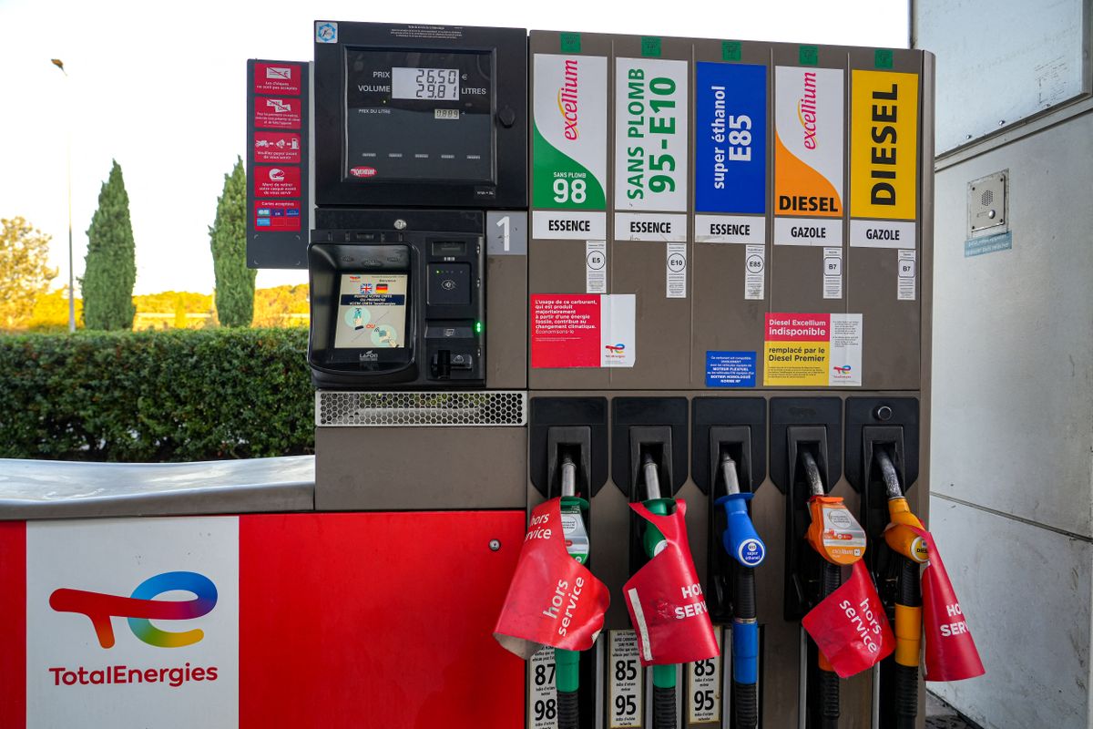 Close-up of petrol pump nozzles at a Total Energie service station with plastic indicating Out of Service due to a stock shortage and scarcity of petrol and diesel fuel caused by the capping of reduced fuel prices at this establishment in Bouc Bel Air in the Bouches du Rhone department in southeastern France on September 20, 2026. Fuel prices have risen sharply in response to French discontent, as they protest against the decline in their purchasing power and demand tax cuts. Meanwhile, Total has capped prices. (Photo by Nicolas Guyonnet / Hans Lucas via AFP)