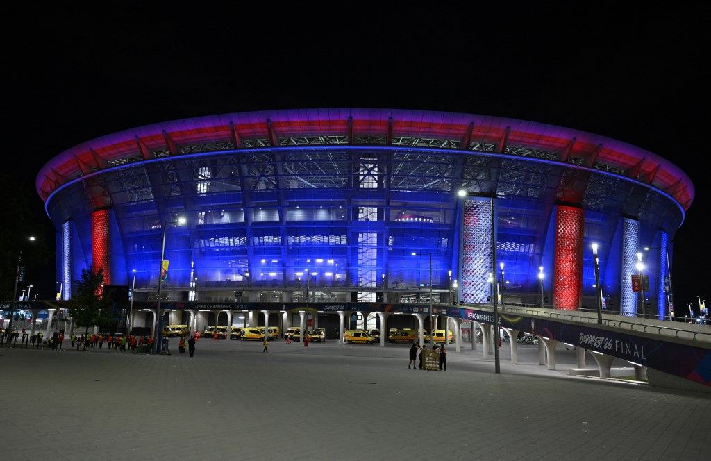 The Puskas Arena shines in the colors of PSG after Saint Germain won the UEFA Champions League final football match against Arsenal FC in Budapest on May 30, 2026. (Photo by JURE MAKOVEC / AFP)