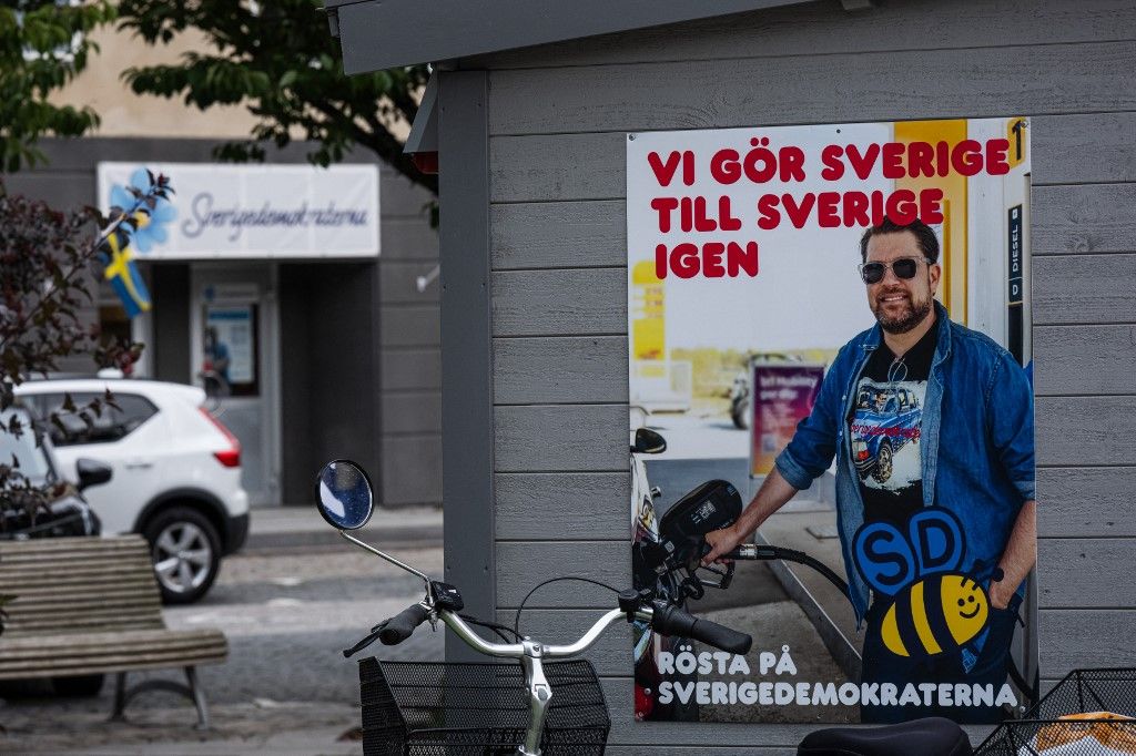 An election campaign poster featuring Sweden Democrats leader Jimmie Åkesson and the slogan We make Sweden Sweden again is displayed in Hoerby, Skane County, southern Sweden, on September 2, 2026, ahead of Swedens general election on September 13. (Photo by Jonathan NACKSTRAND / AFP)