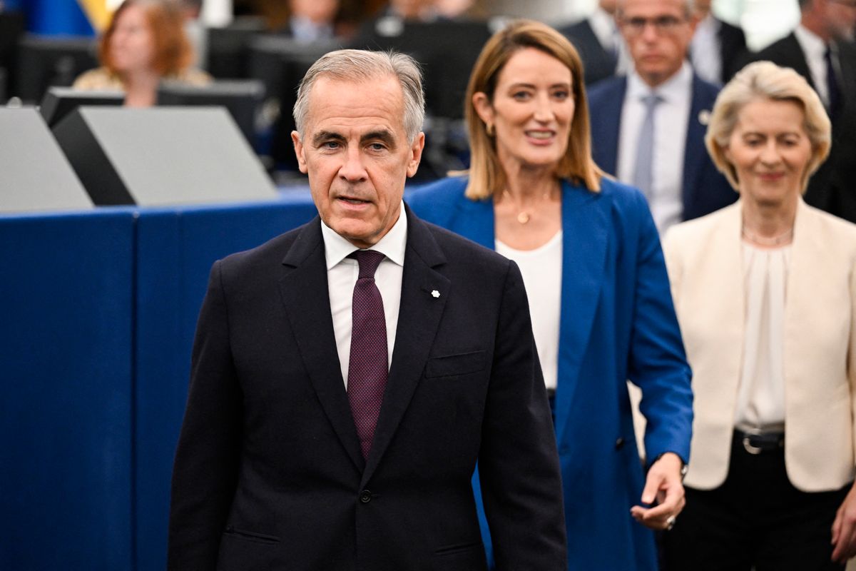 (From L) Canada's Prime Minister Mark Carney, EU Parliament President Roberta Metsola and European Commission President Ursula von der Leyen arrive for a speech during European Commission President's annual State of the Union address at a plenary session of the European Parliament in Strasbourg, eastern France on September 16, 2026. EU chief Ursula von der Leyen said on September 16, 2026 the future of the 27-nation bloc depends on how it manages climate change and artificial intelligence, as she delivered a major speech in Strasbourg. (Photo by Jean-Christophe VERHAEGEN / AFP)