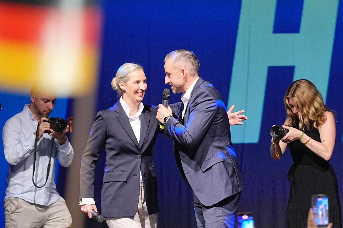 06 September 2026, Saxony-Anhalt, Magdeburg: Ulrich Siegmund (center right, AfD), lead candidate and co-chair of the AfD state parliamentary group in Saxony-Anhalt, and Alice Weidel (center left, AfD), federal chair and co-chair of the AfD parliamentary group in the Bundestag, stand on stage at the AfDs election party at the Altes Theater. On Sunday (September 6, 2026), a new state parliament was elected in Saxony-Anhalt. Photo: Michael Kappeler/dpa (Photo by MICHAEL KAPPELER / dpa Picture-Alliance via AFP)