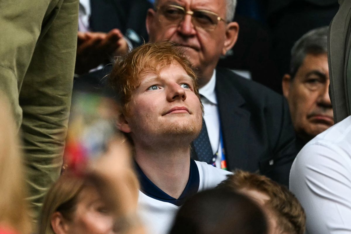 English singer-songwriter Ed Sheeran watches the UEFA Euro 2024 round of 16 football match between England and Slovakia at the Arena AufSchalke in Gelsenkirchen on June 30, 2024. (Photo by PATRICIA DE MELO MOREIRA / AFP)