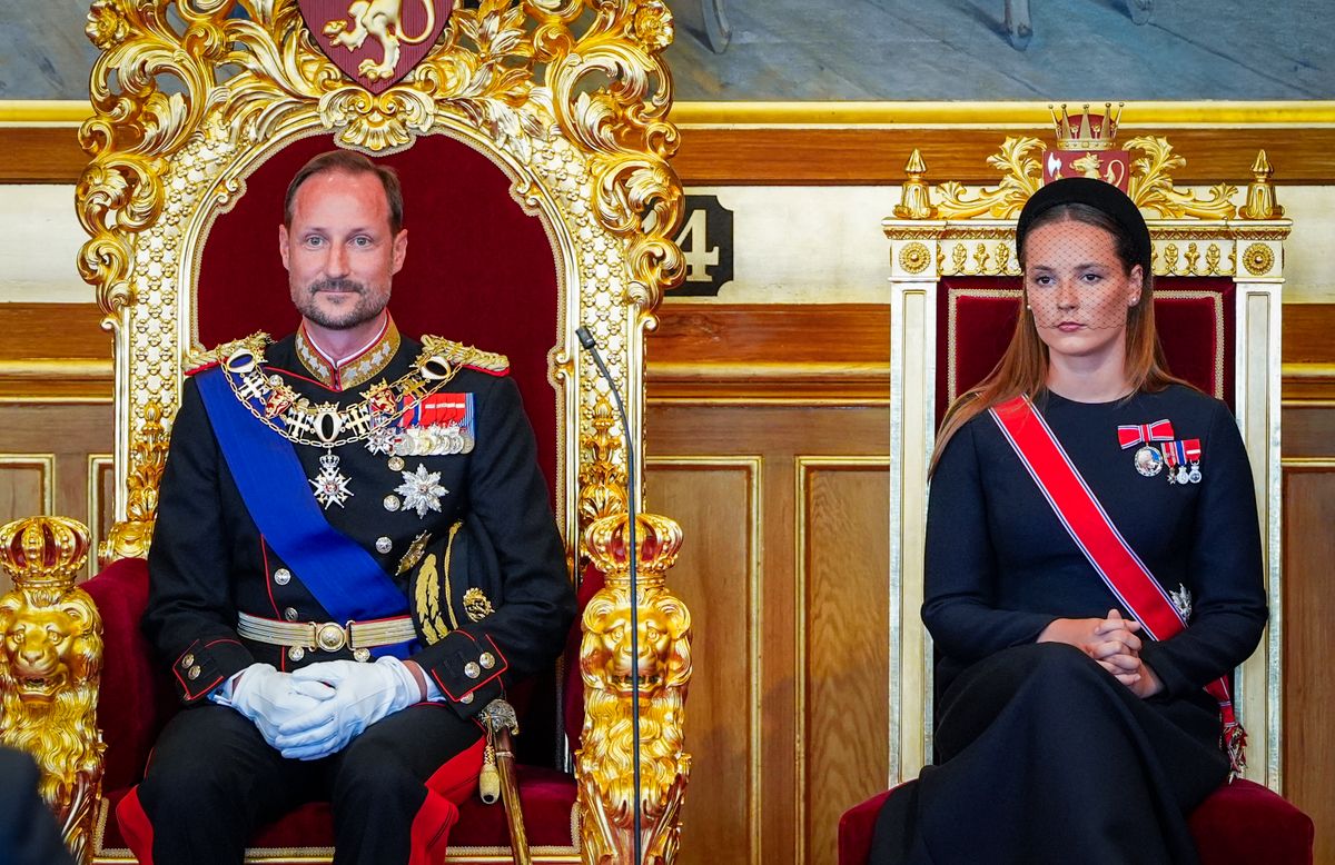 Crown Princess Ingrid Alexandra of Norway (R) sits next to her father King Haakon VIII of Norway during an oath-taking ceremony for the new king to Norway's constitution in the main chamber of the Norwegian Parliament, the Storting, in Oslo on September 1, 2026. Haakon became king when his father King Harald V died in the morning of August 28 aged 89. (Photo by Lise Åserud / NTB / AFP) / Norway OUT